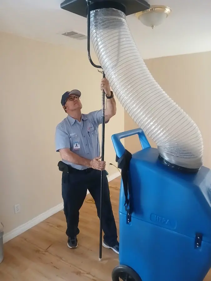 HVAC Installation technician using HEPA equipment in Gaines